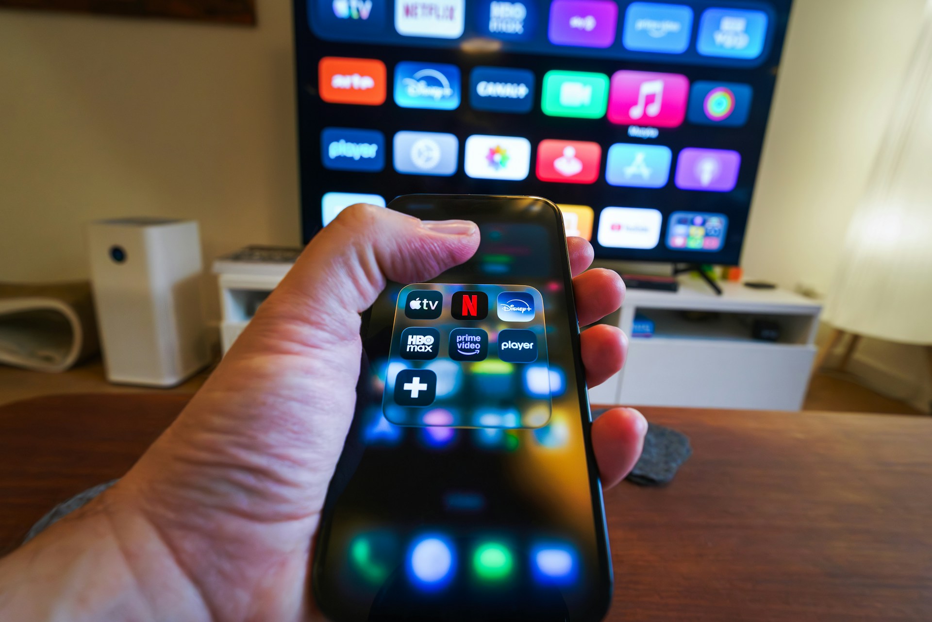 Streaming platforms icon home entertainment smartphone television remote control living room