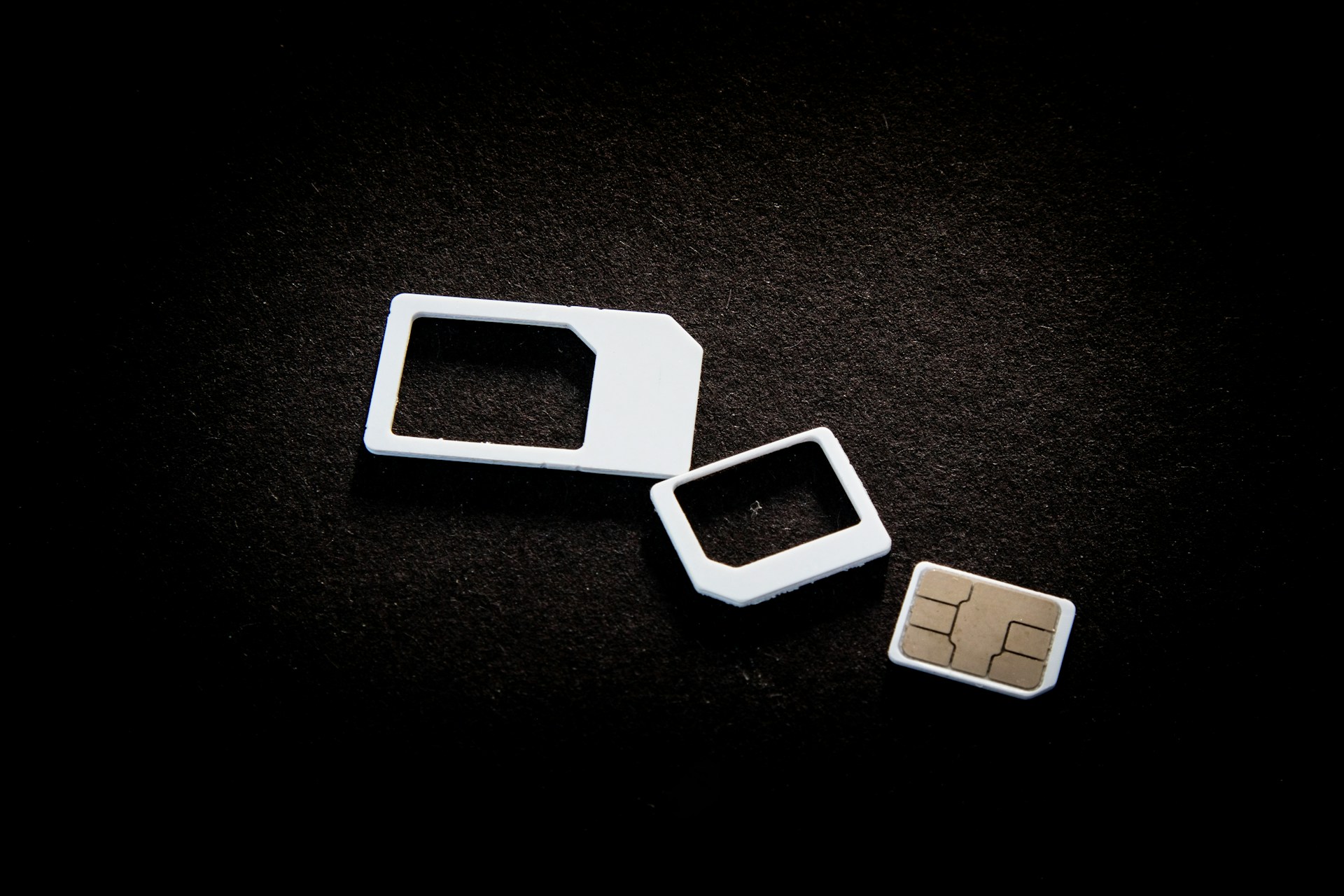 Sim cards and their adaptors are on display